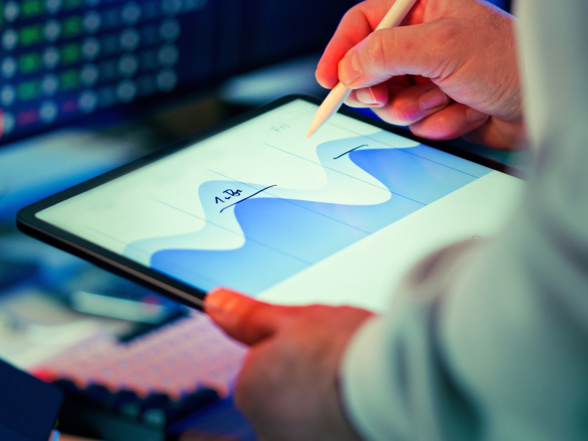 Analyst reviewing operational trial data